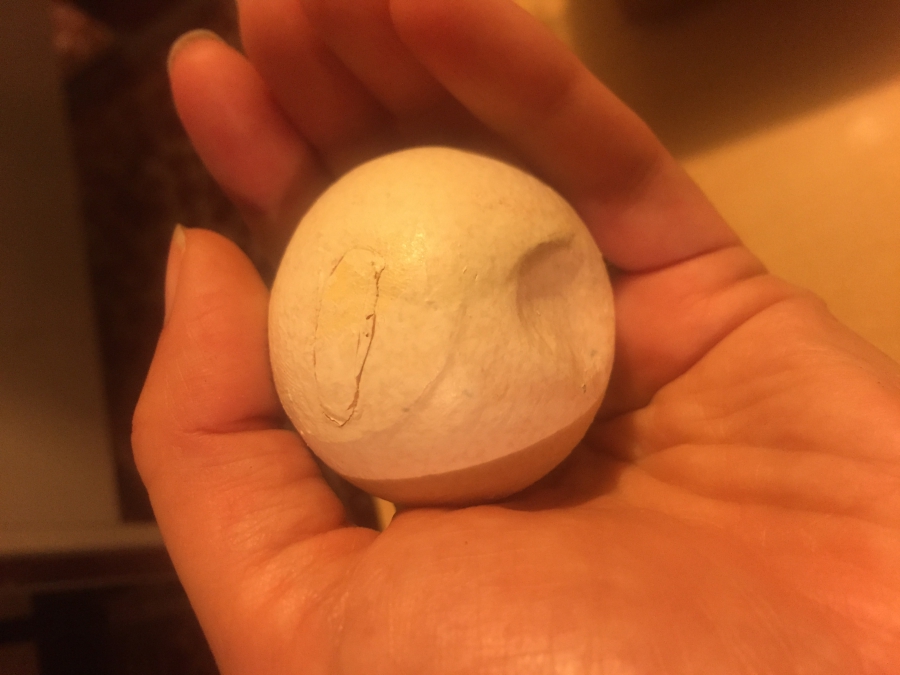 The fake egg, once it's finished, looks like a ping pong ball with a dimple in it. The fake egg, once it's finished, looks like a ping pong ball with a dimple in it.